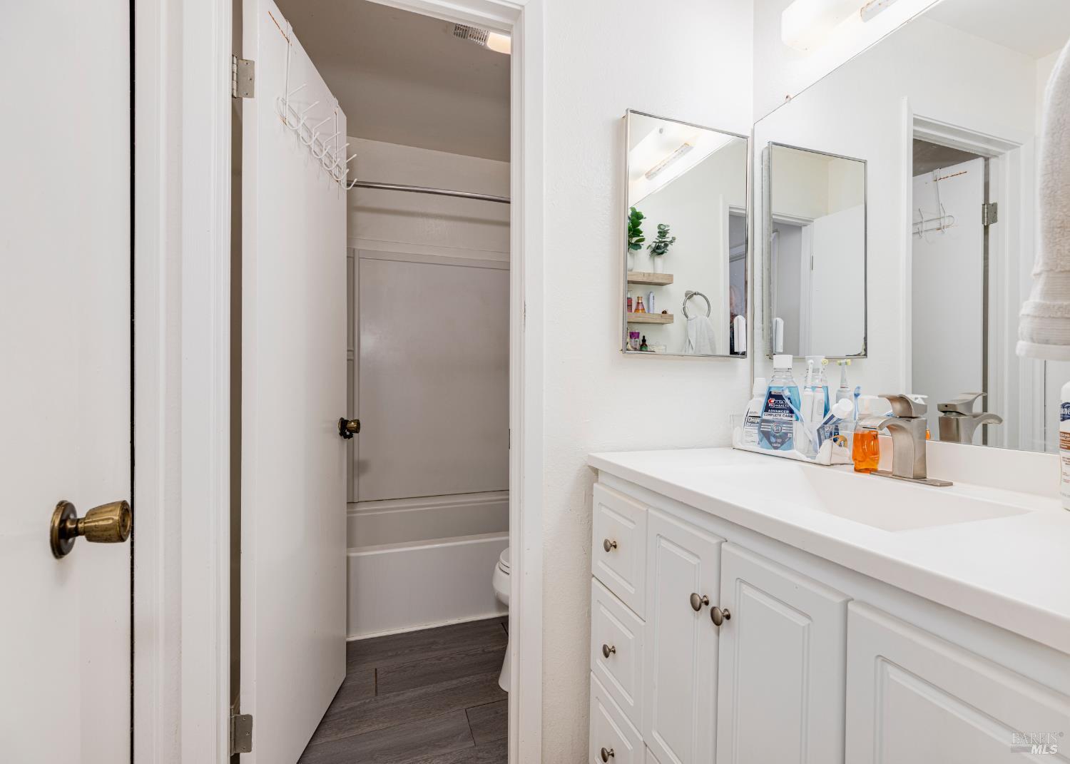 668 Racquet Club Circle Rohnert Park, CA 94928 - Photo 20 of 28 a bathroom with a sink and a mirror