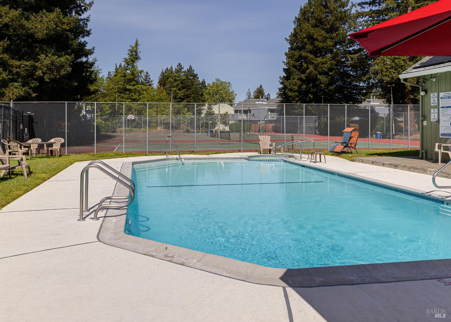 668 Racquet Club Circle Rohnert Park, CA 94928 - Photo 25 of 28 a view of a swimming pool with a patio