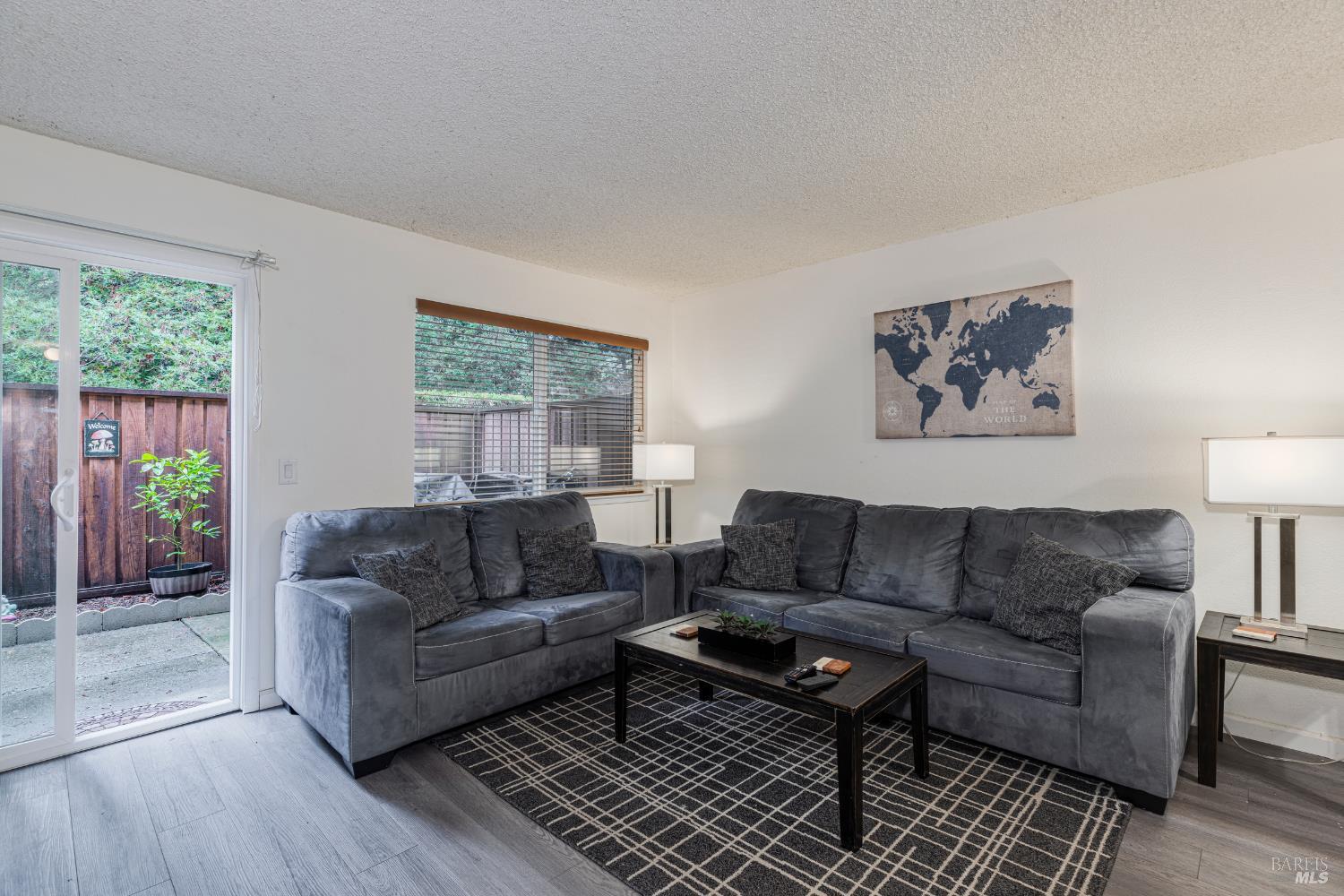 668 Racquet Club Circle Rohnert Park, CA 94928 - Photo 6 of 28 a living room with furniture and a large window