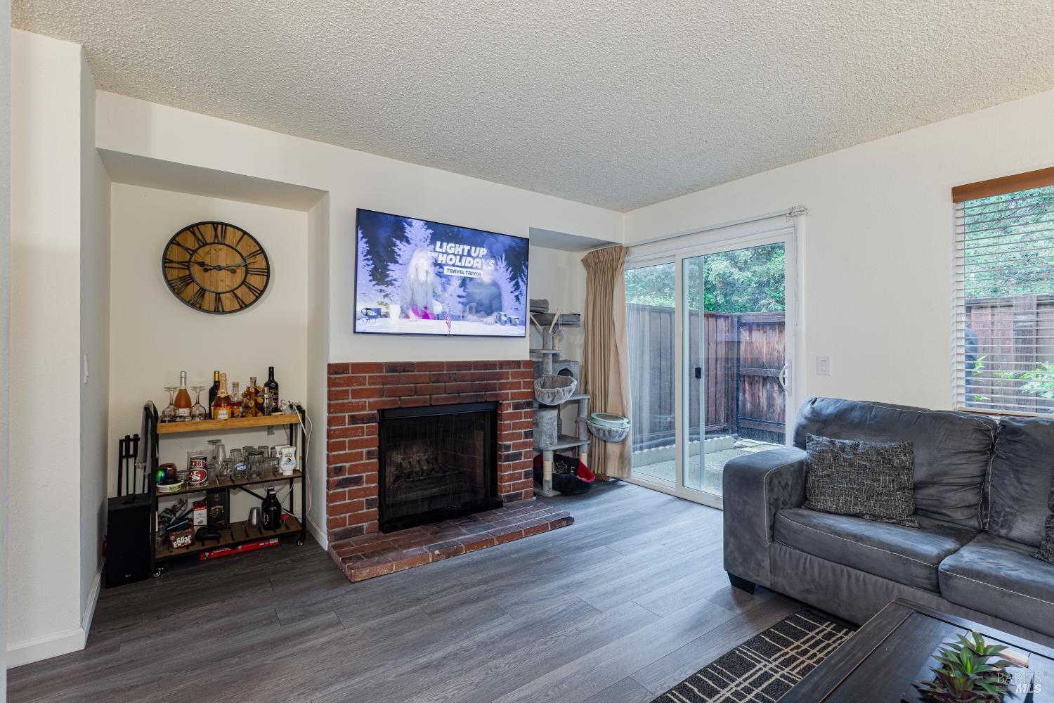 668 Racquet Club Circle Rohnert Park, CA 94928 - Photo 7 of 28 a living room with furniture and a fireplace