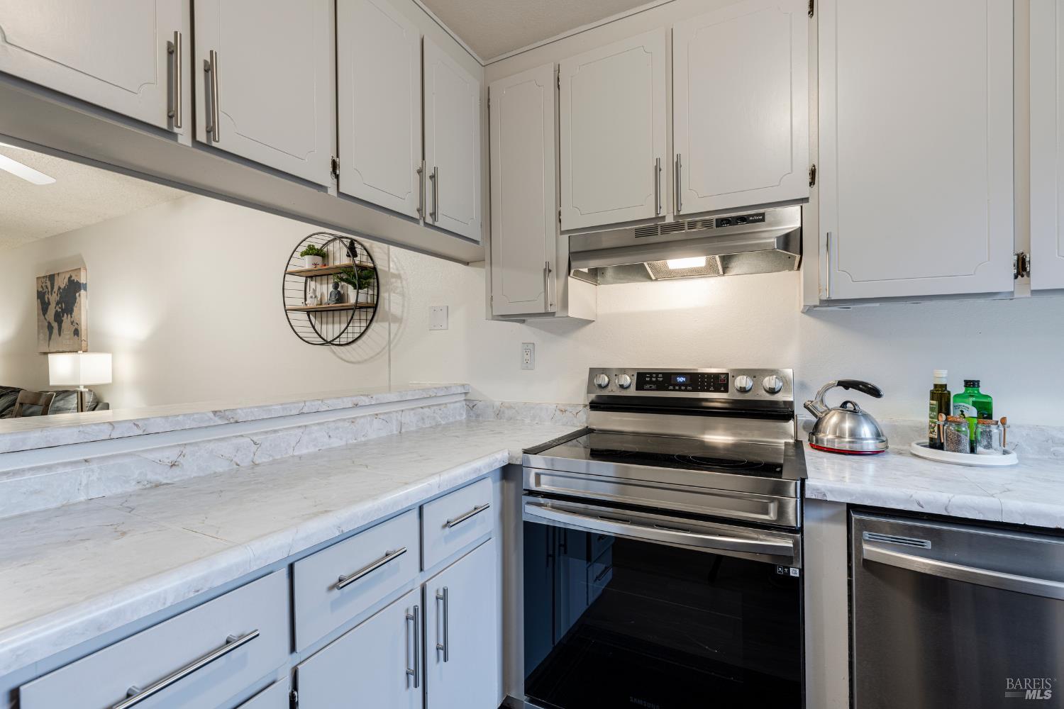 668 Racquet Club Circle Rohnert Park, CA 94928 - Photo 8 of 28 a kitchen with appliances cabinets and a counter top space