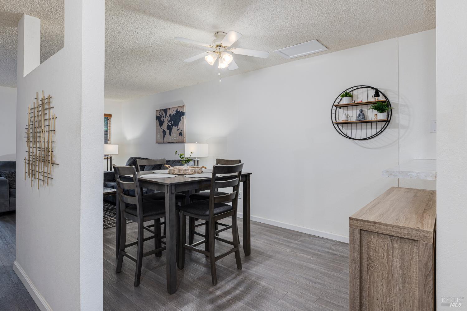 668 Racquet Club Circle Rohnert Park, CA 94928 - Photo 10 of 28 a view of a dining room with furniture and wooden floor