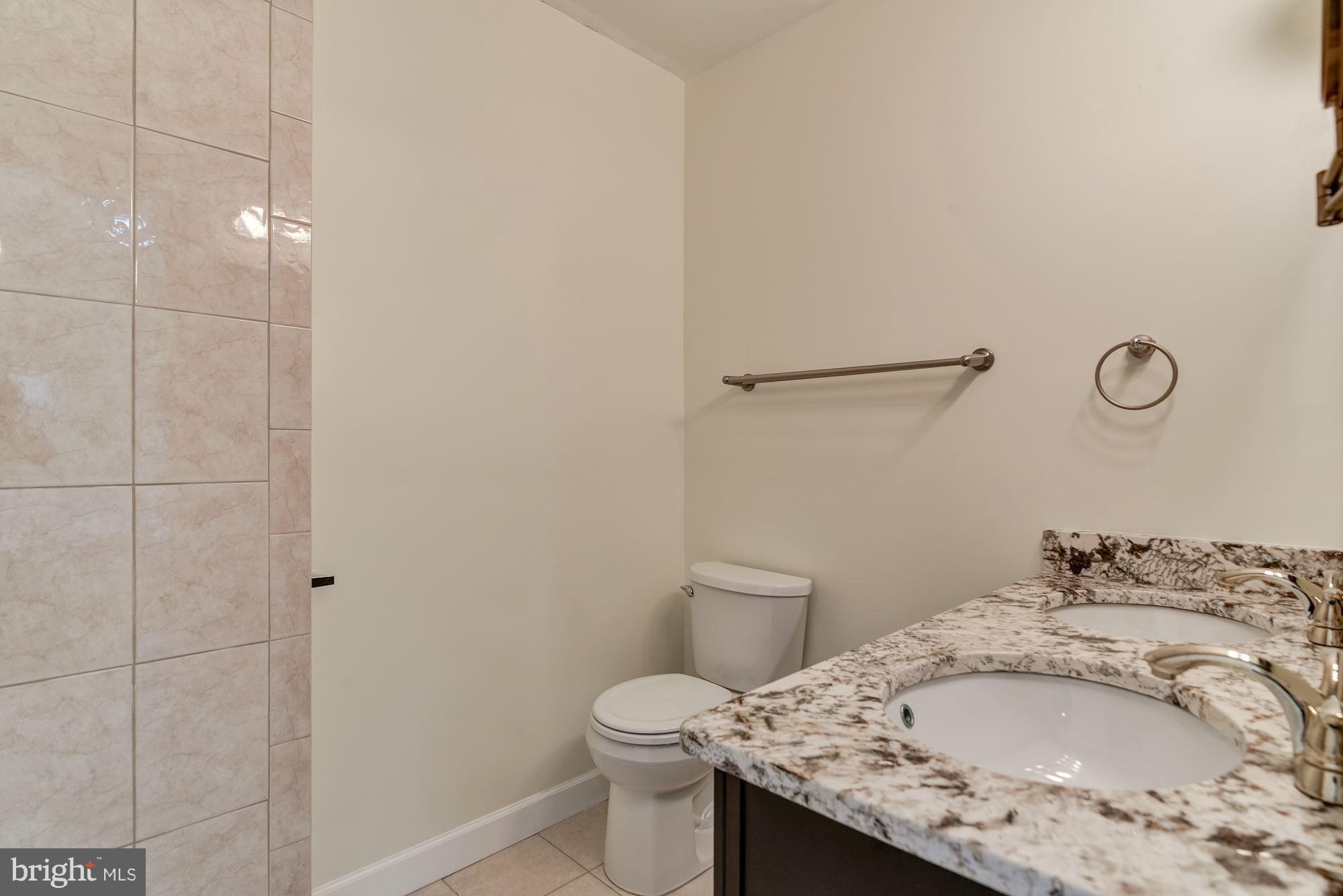 1506 Gleason Street Silver Spring, MD 20902 - Photo 17 of 30 Dual vanities and custom tile work