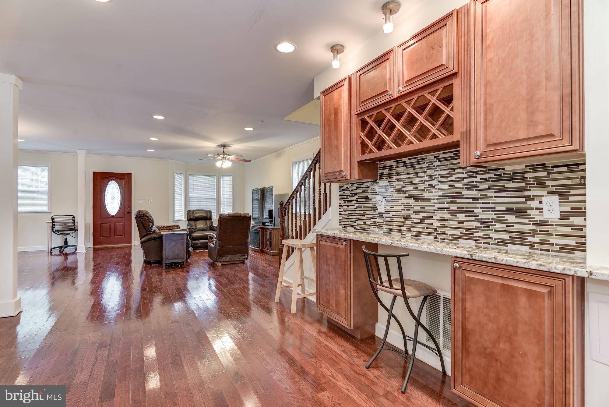 1506 Gleason Street Silver Spring, MD 20902 - Photo 6 of 30 Take a look at that custom wine rack and bar