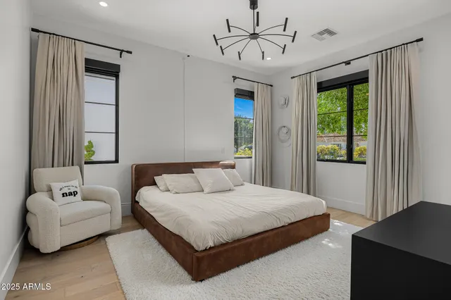 a view of an chairs in backyard