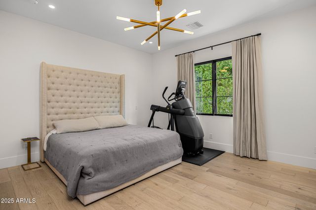 an aerial view of a house with outdoor space