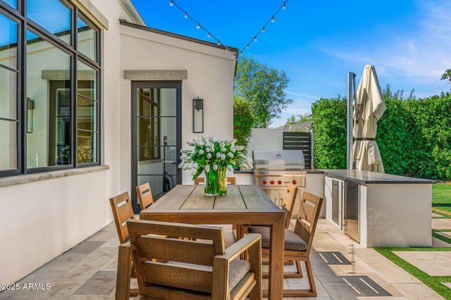 a living room with furniture a window and a fireplace