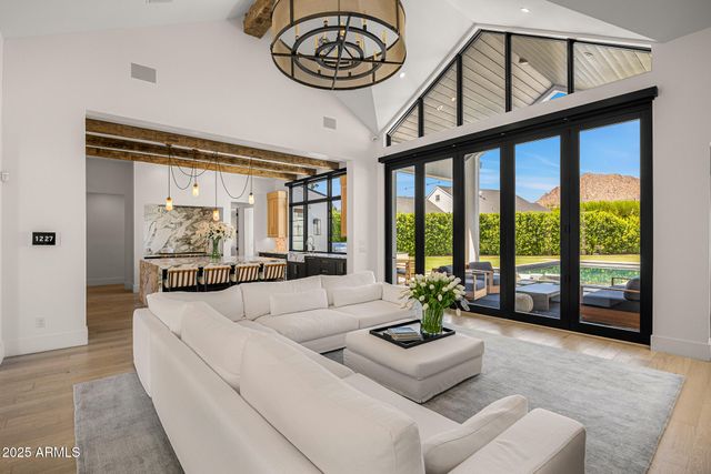 a kitchen with stainless steel appliances granite countertop a sink and a counter space