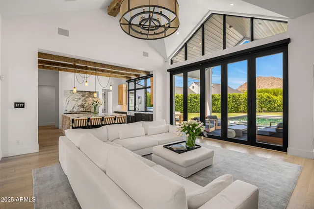 a kitchen with stainless steel appliances granite countertop a sink and a counter space