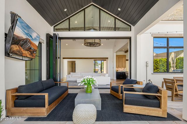 a kitchen with stainless steel appliances granite countertop a sink and a window