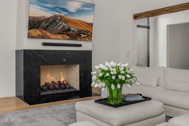 a view of a dining room with furniture and window