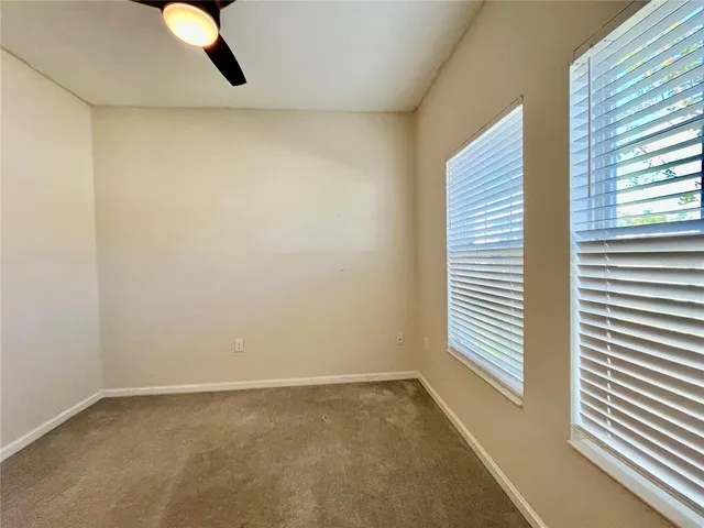 a bathroom with a toilet and a bathtub