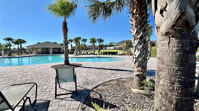 a front view of a house with swimming pool