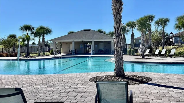 a view of a lake with a yard