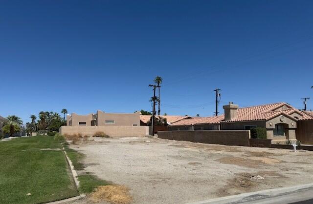 55 Saguaro Road La Quinta, CA 92253 - Photo 3 of 4 a house with a yard