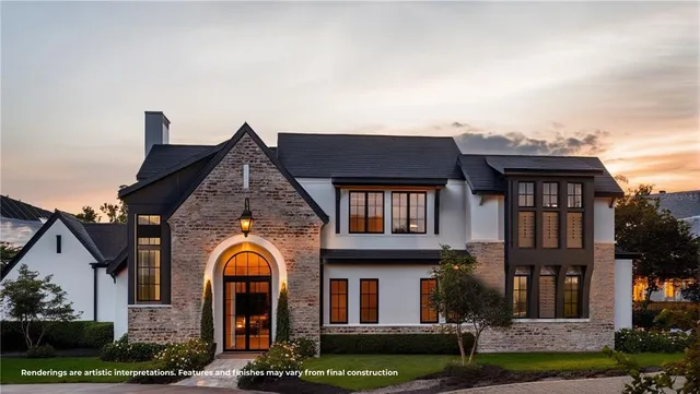 a front view of a house with yard and porch
