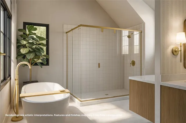 a white toilet sitting next to a bathroom sink