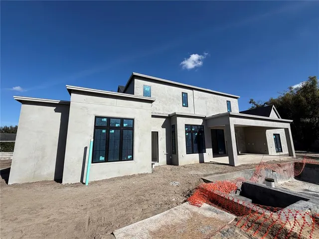 a front view of a house with a entertaining space