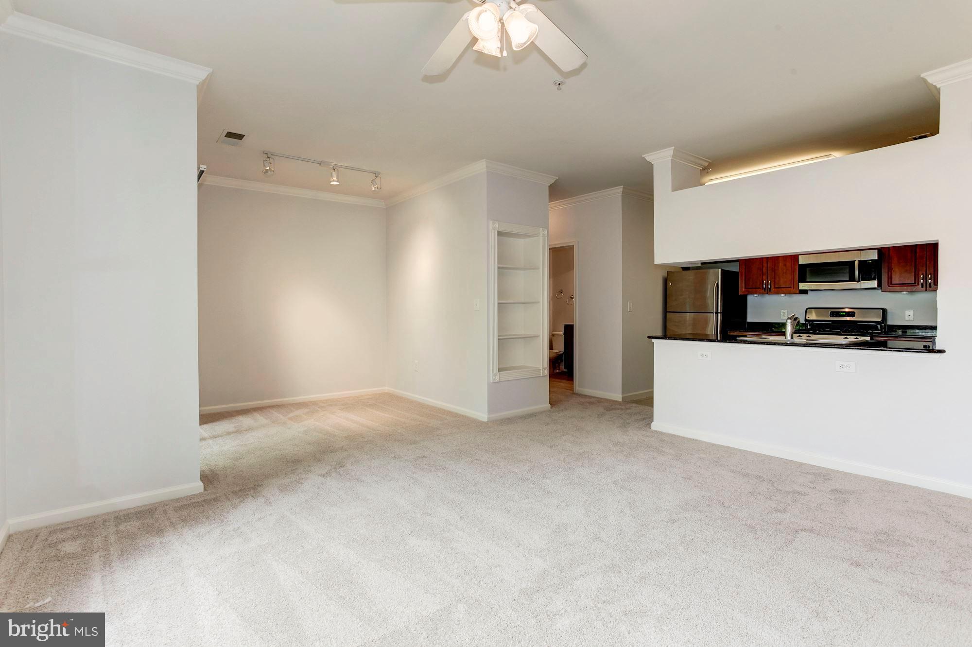 12128 Garden Ridge Lane, Unit 203 Fairfax, VA 22030 - Photo 14 of 40 Living & Dining Room