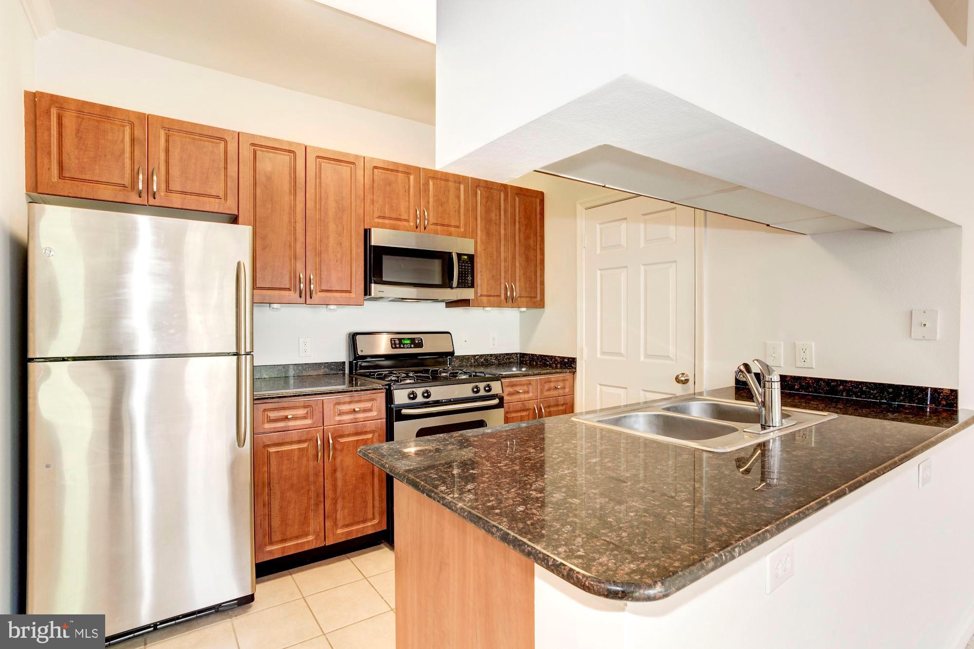 12128 Garden Ridge Lane, Unit 203 Fairfax, VA 22030 - Photo 6 of 40 Kitchen