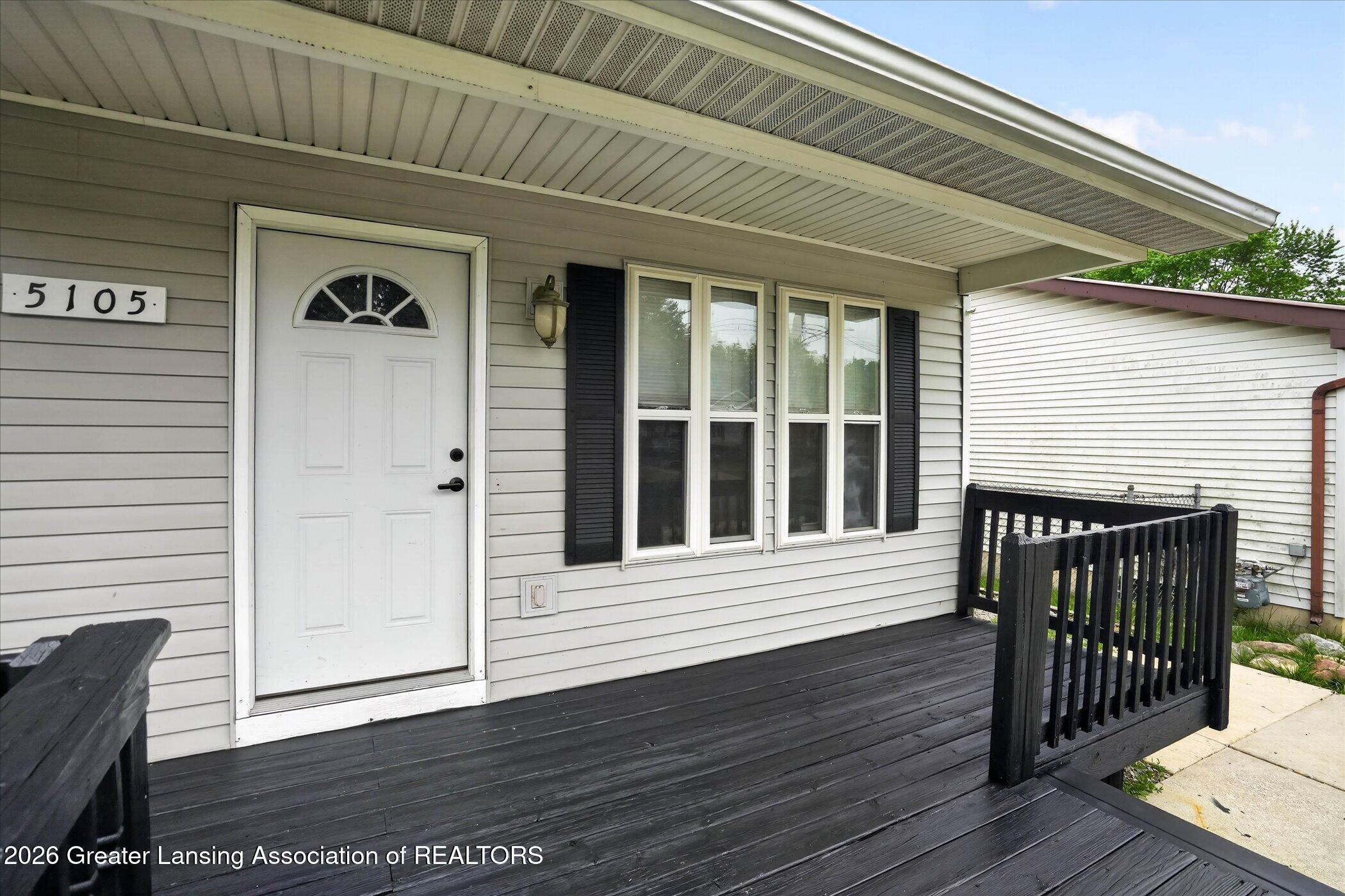 5105 Hughes Road Lansing, MI 48911 - Photo 3 of 26 05-5105-Hughes-Rd-WindowStill-Photograph