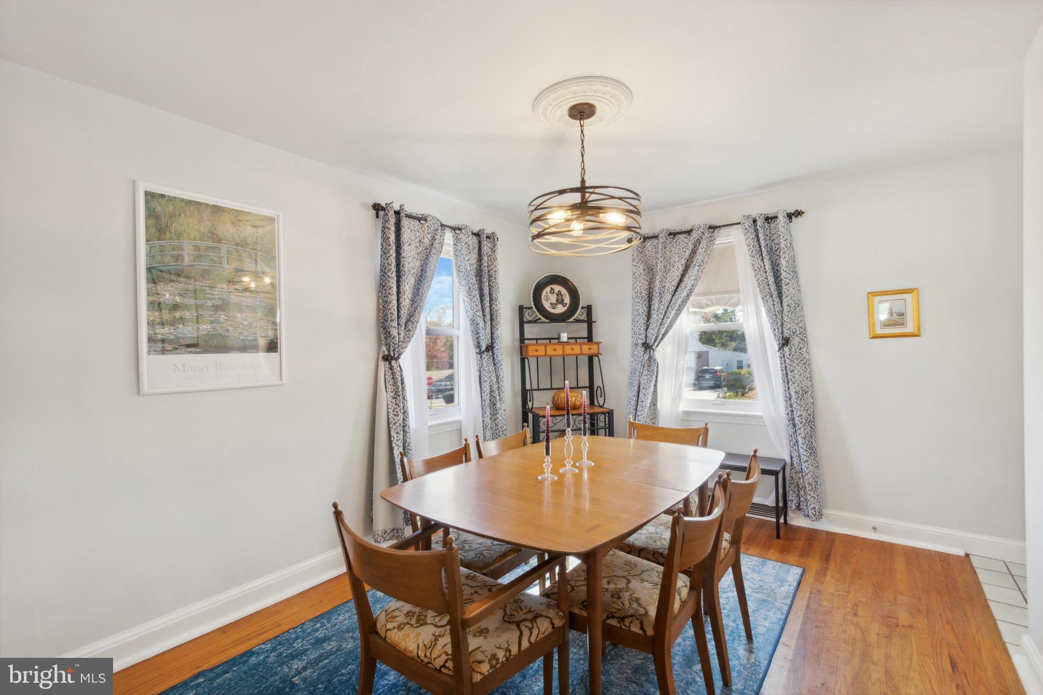 408 Barker Road Springfield, PA 19064 - Photo 9 of 22 a view of a dining room with furniture and wooden floor