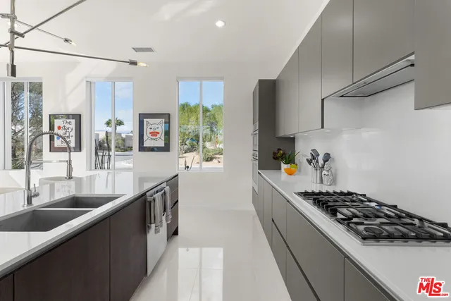 a view of a backyard with a garden and staircase