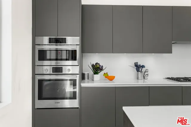 a view of a house with a backyard and a swimming pool