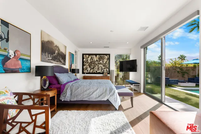 a bathroom with a sink double vanity and a mirror