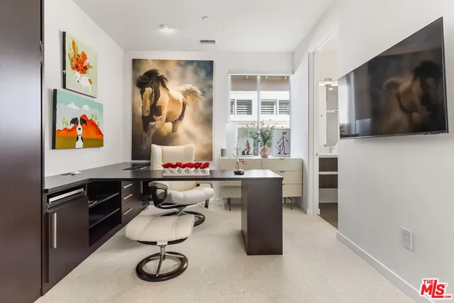 a view of lake with a house in the background