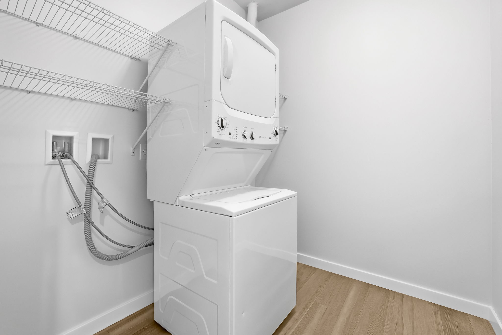 71 Connecticut Avenue, Unit 209 Norwalk, CT 06850 - Photo 22 of 25 a utility room with dryer and washer