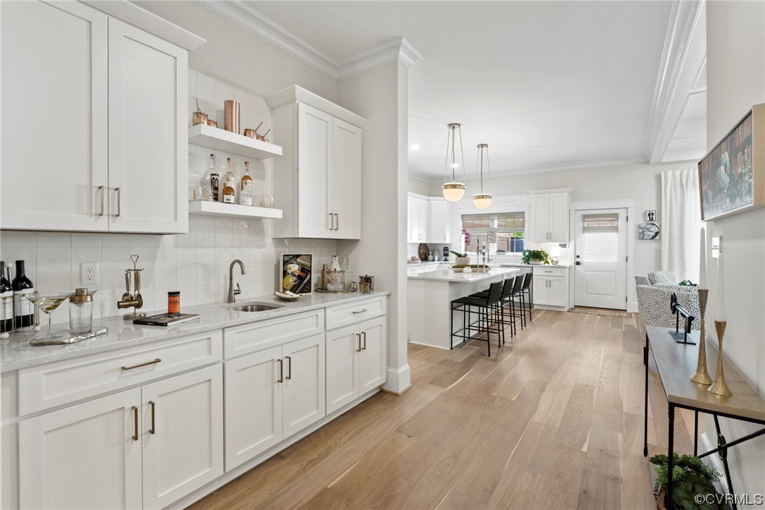2542 Pagehurst Drive, Unit 8 Midlothian, VA 23113 - Photo 15 of 42 a kitchen with white cabinets and sink