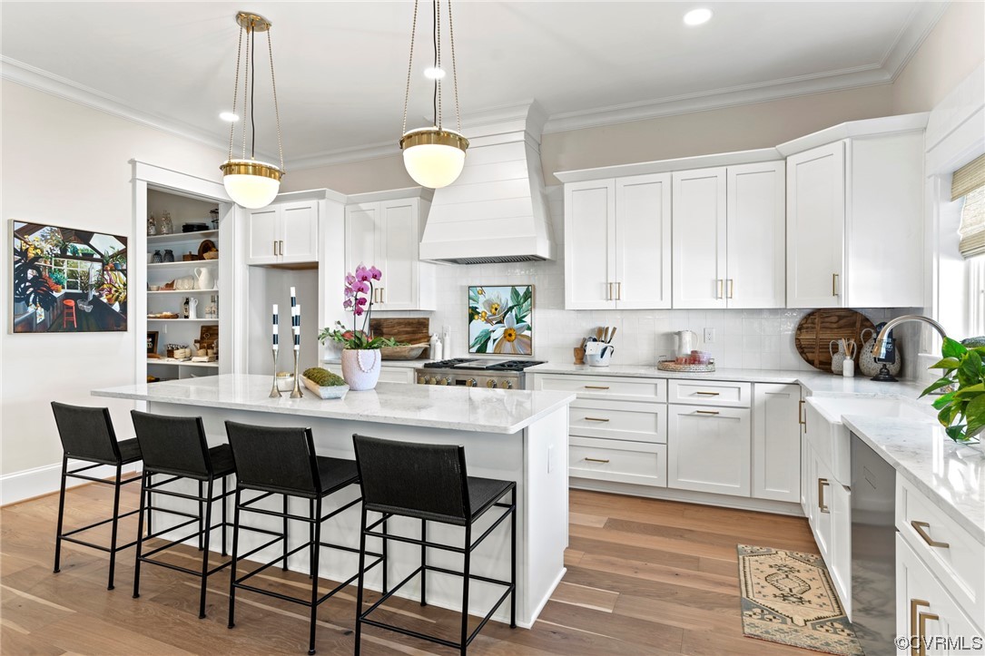 2542 Pagehurst Drive, Unit 8 Midlothian, VA 23113 - Photo 16 of 42 a kitchen with a white cabinets and chairs in it