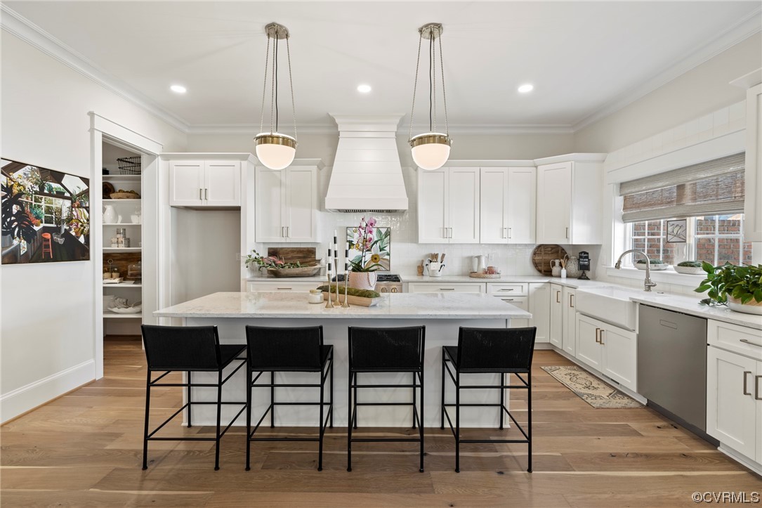 2542 Pagehurst Drive, Unit 8 Midlothian, VA 23113 - Photo 20 of 42 a kitchen with cabinets table and chairs