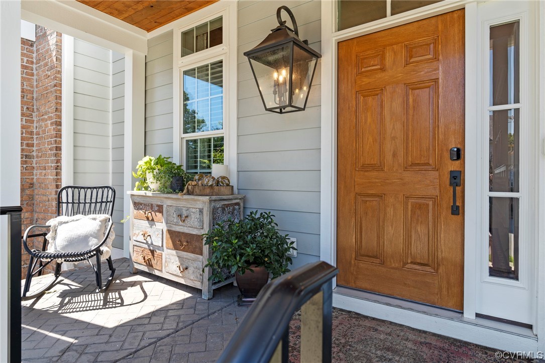 2542 Pagehurst Drive, Unit 8 Midlothian, VA 23113 - Photo 2 of 42 a living room with furniture and wooden floor