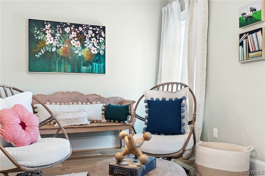 2542 Pagehurst Drive, Unit 8 Midlothian, VA 23113 - Photo 28 of 42 a living room with furniture and a floor to ceiling window