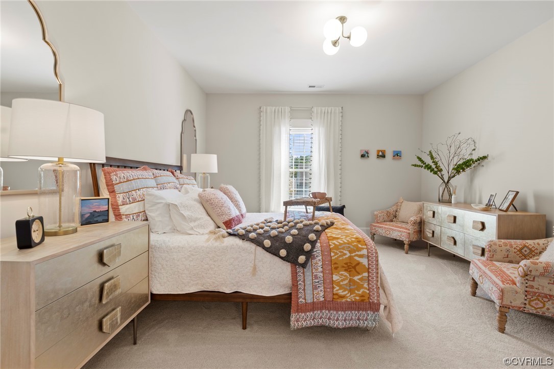 2542 Pagehurst Drive, Unit 8 Midlothian, VA 23113 - Photo 36 of 42 a bedroom with bed and window