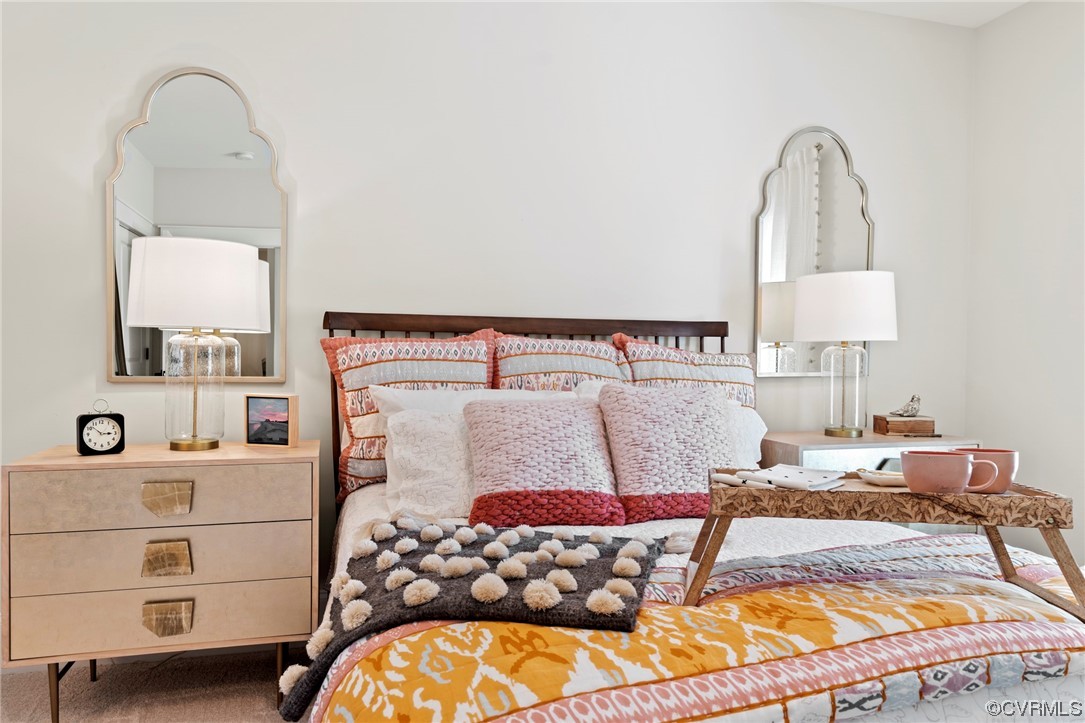 2542 Pagehurst Drive, Unit 8 Midlothian, VA 23113 - Photo 38 of 42 a bedroom with a bed and dresser