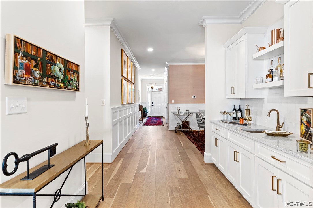 2542 Pagehurst Drive, Unit 8 Midlothian, VA 23113 - Photo 4 of 42 a large kitchen with stainless steel appliances granite countertop a lot of counter space and wooden floors