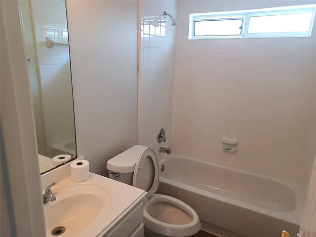a bathroom with a sink and toilet
