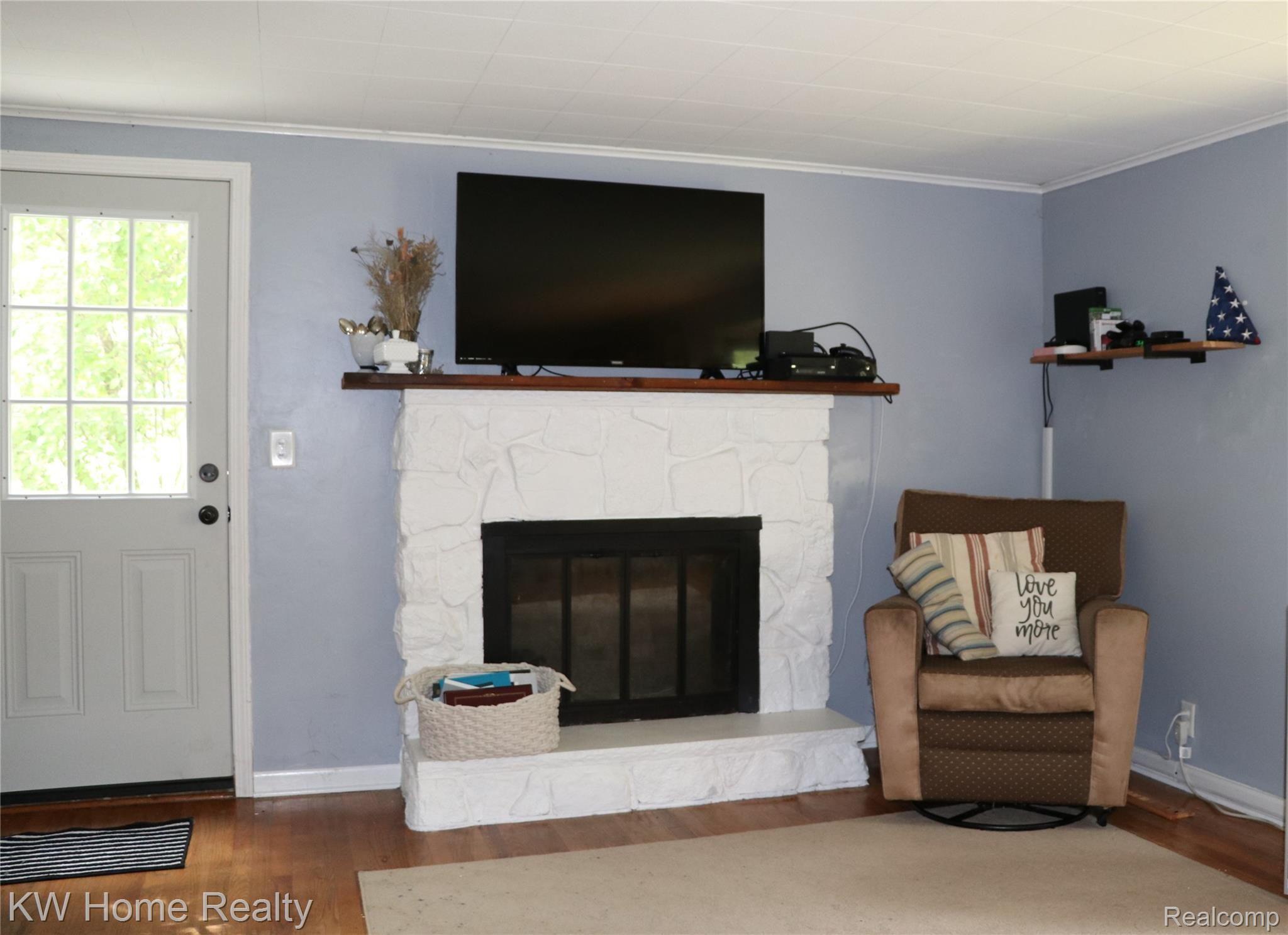 2706 Norton Lawn Street Rochester, MI 48307 - Photo 17 of 29 Living Room Fireplace