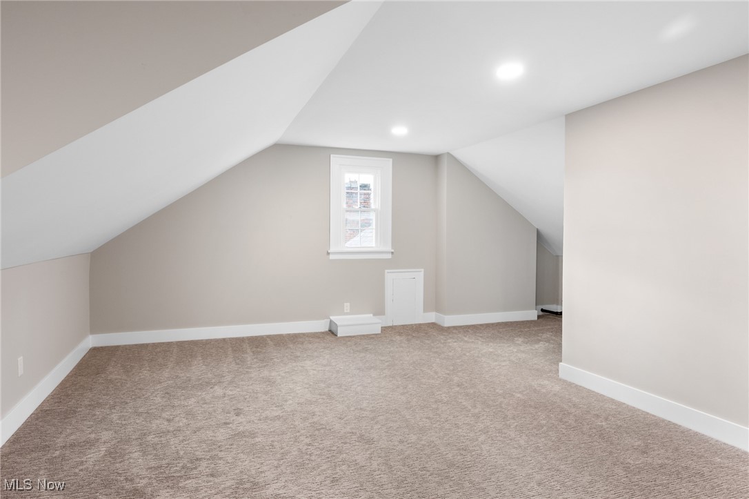 2854 Corydon Road Cleveland, OH 44118 - Photo 34 of 41 Bonus room with baseboards, carpet floors, lofted ceiling, and recessed lighting
