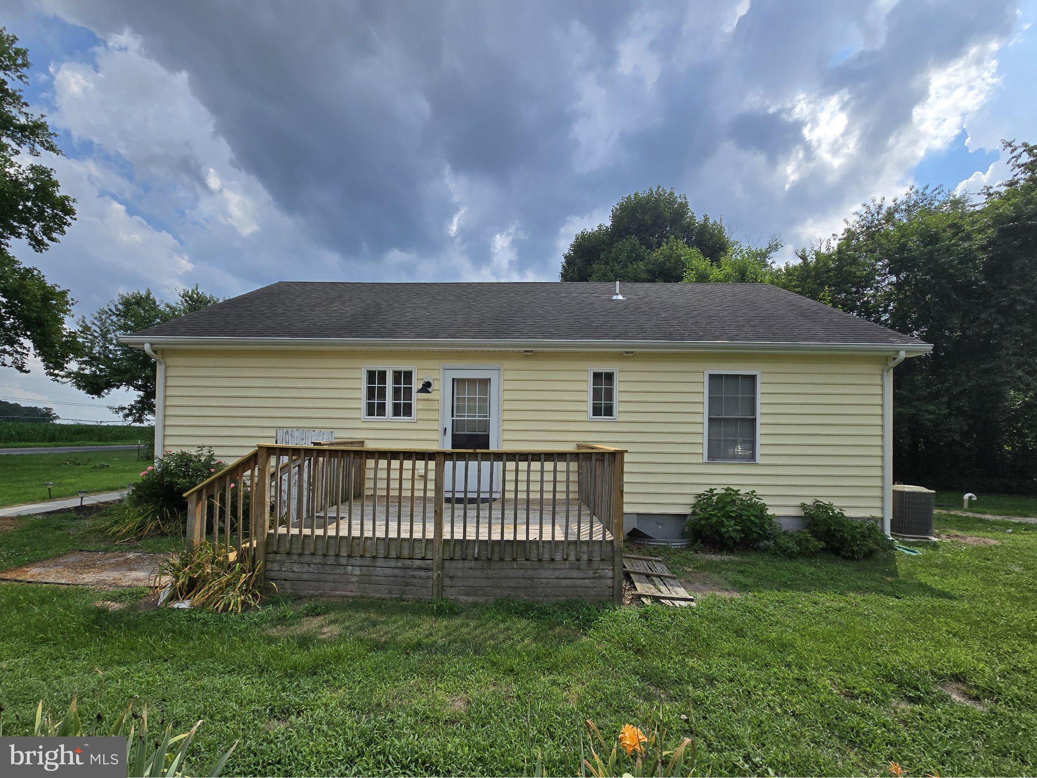 8981 Sharptown Road Laurel, DE 19956 - Photo 3 of 34 Charming yellow home with inviting deck.