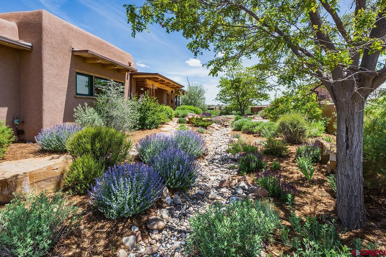 6445 County Road 100 Hesperus, CO 81326 - Photo 26 of 35 a view of a garden with a house