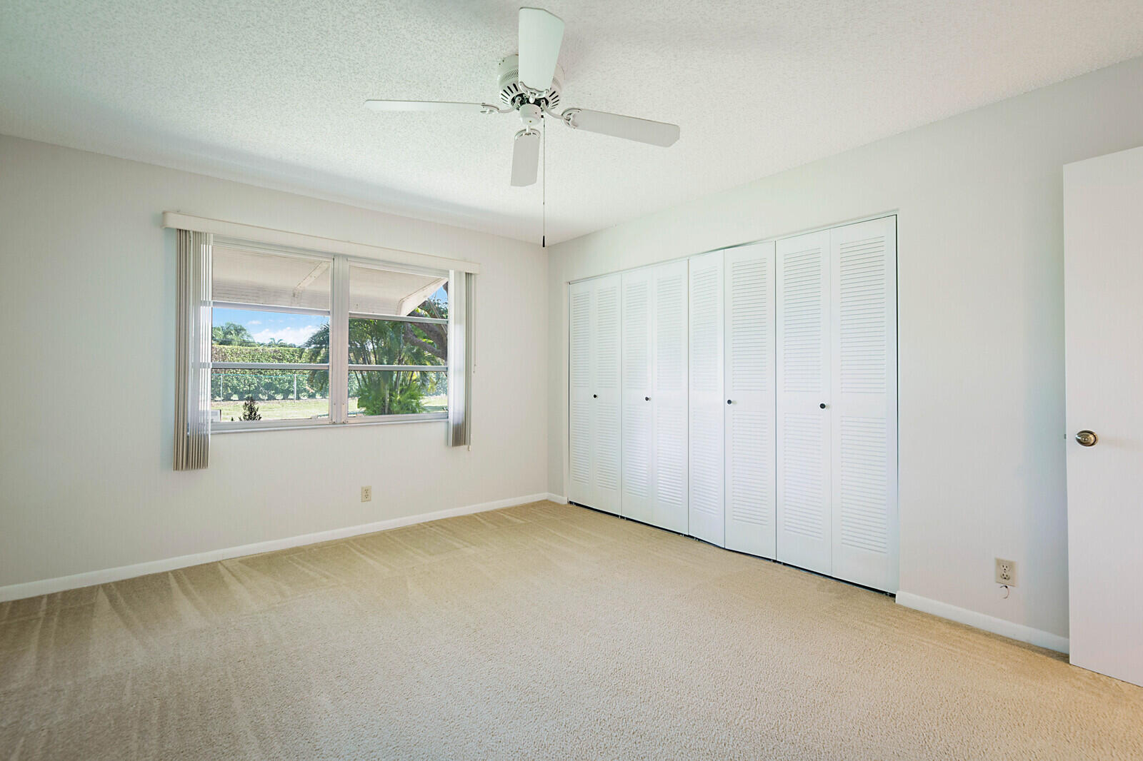 4525 Northwest 3rd Street, Unit D Delray Beach, FL 33445 - Photo 18 of 25 a view of an empty room with a window