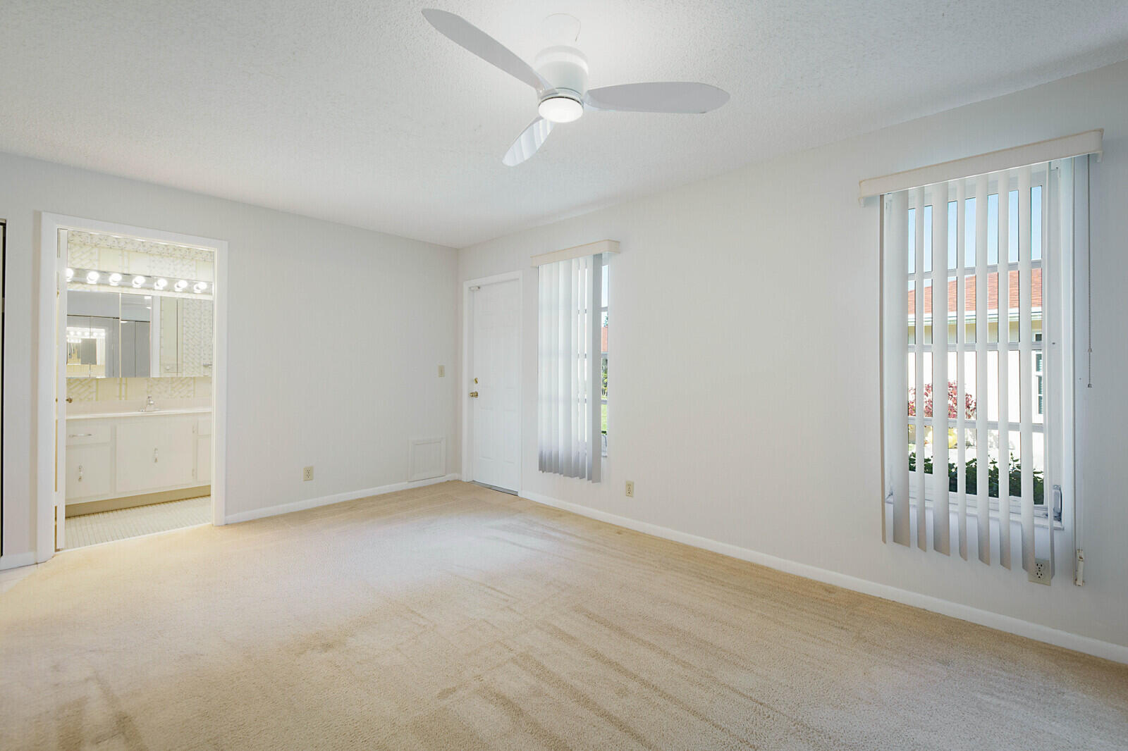 4525 Northwest 3rd Street, Unit D Delray Beach, FL 33445 - Photo 20 of 25 wooden floor in an empty room with a window