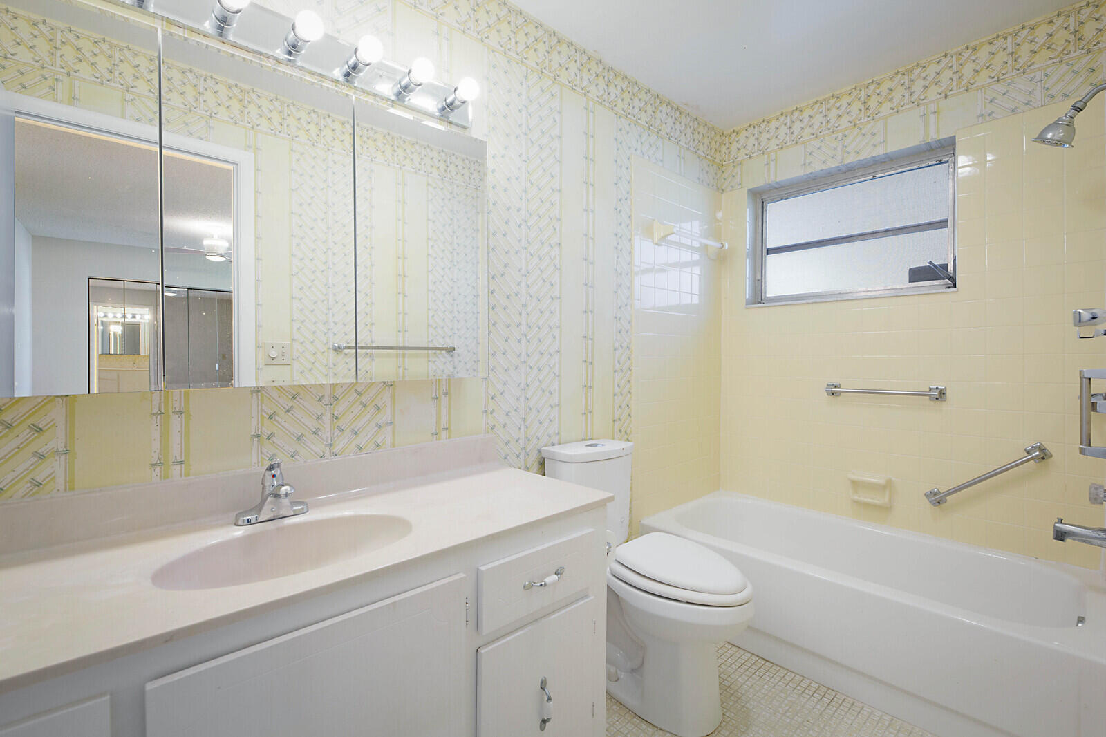 4525 Northwest 3rd Street, Unit D Delray Beach, FL 33445 - Photo 21 of 25 a bathroom with a sink a toilet and shower