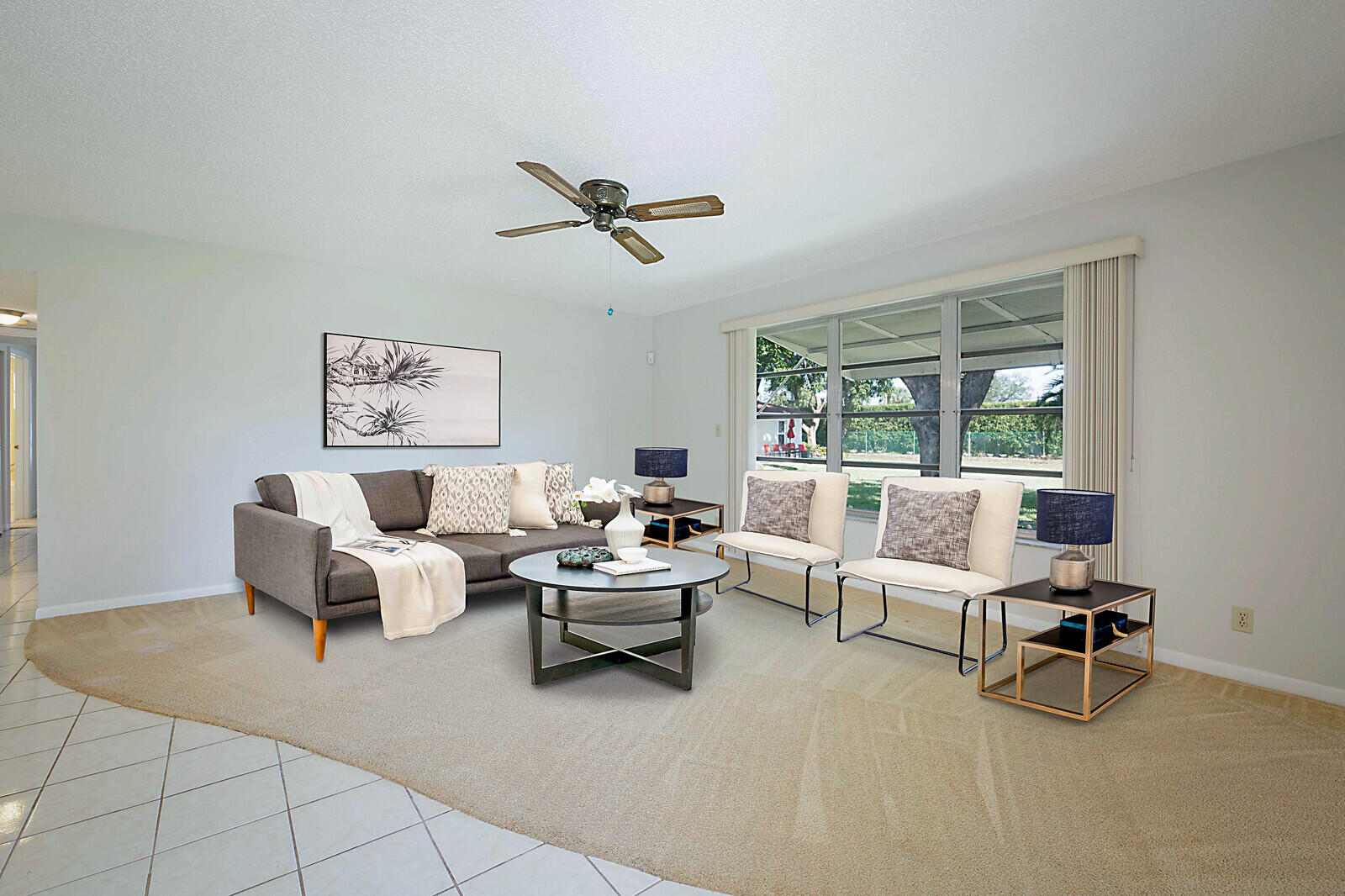 4525 Northwest 3rd Street, Unit D Delray Beach, FL 33445 - Photo 5 of 25 a living room with furniture and a window