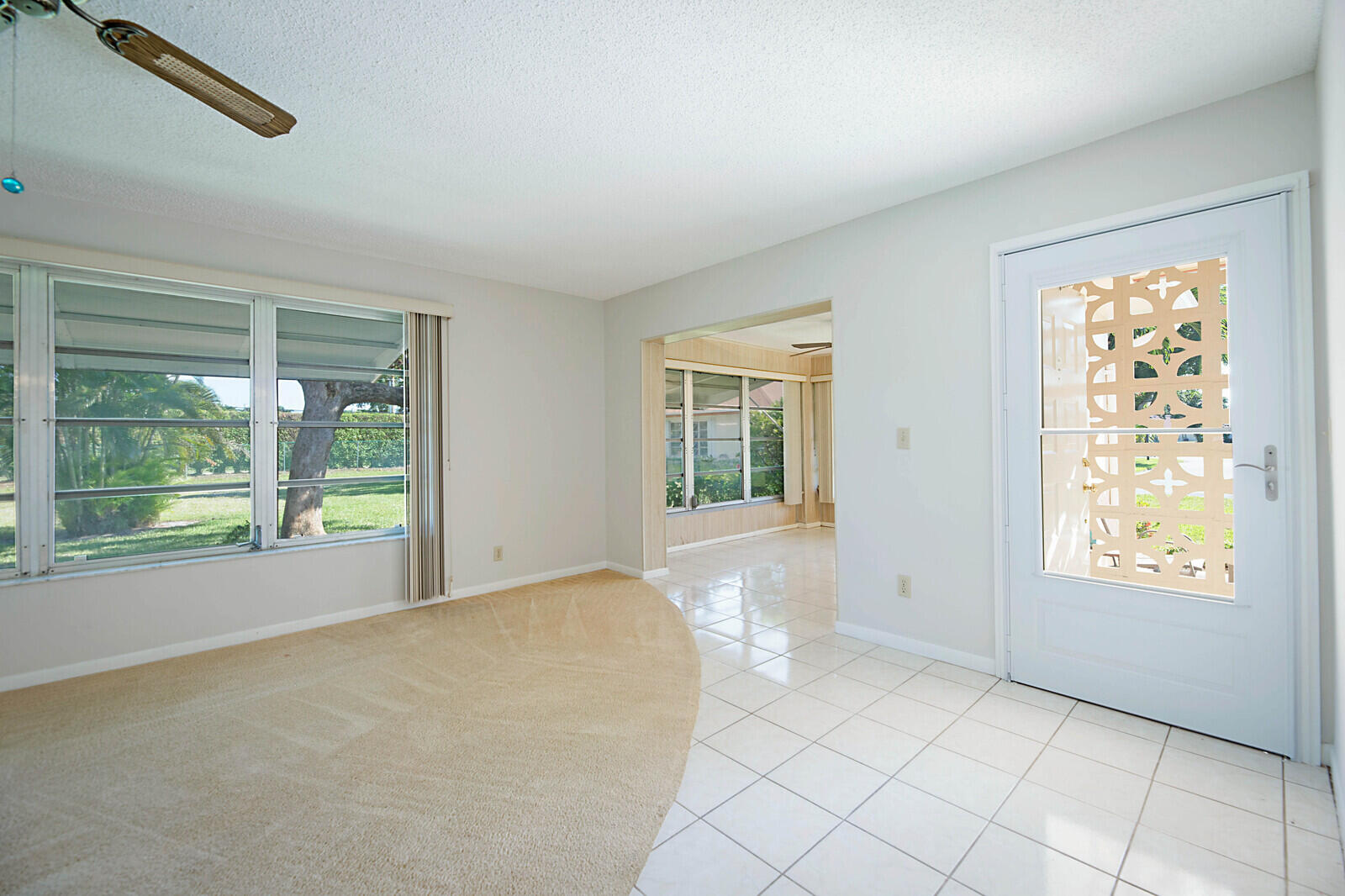 4525 Northwest 3rd Street, Unit D Delray Beach, FL 33445 - Photo 9 of 25 a view of an empty room with windows