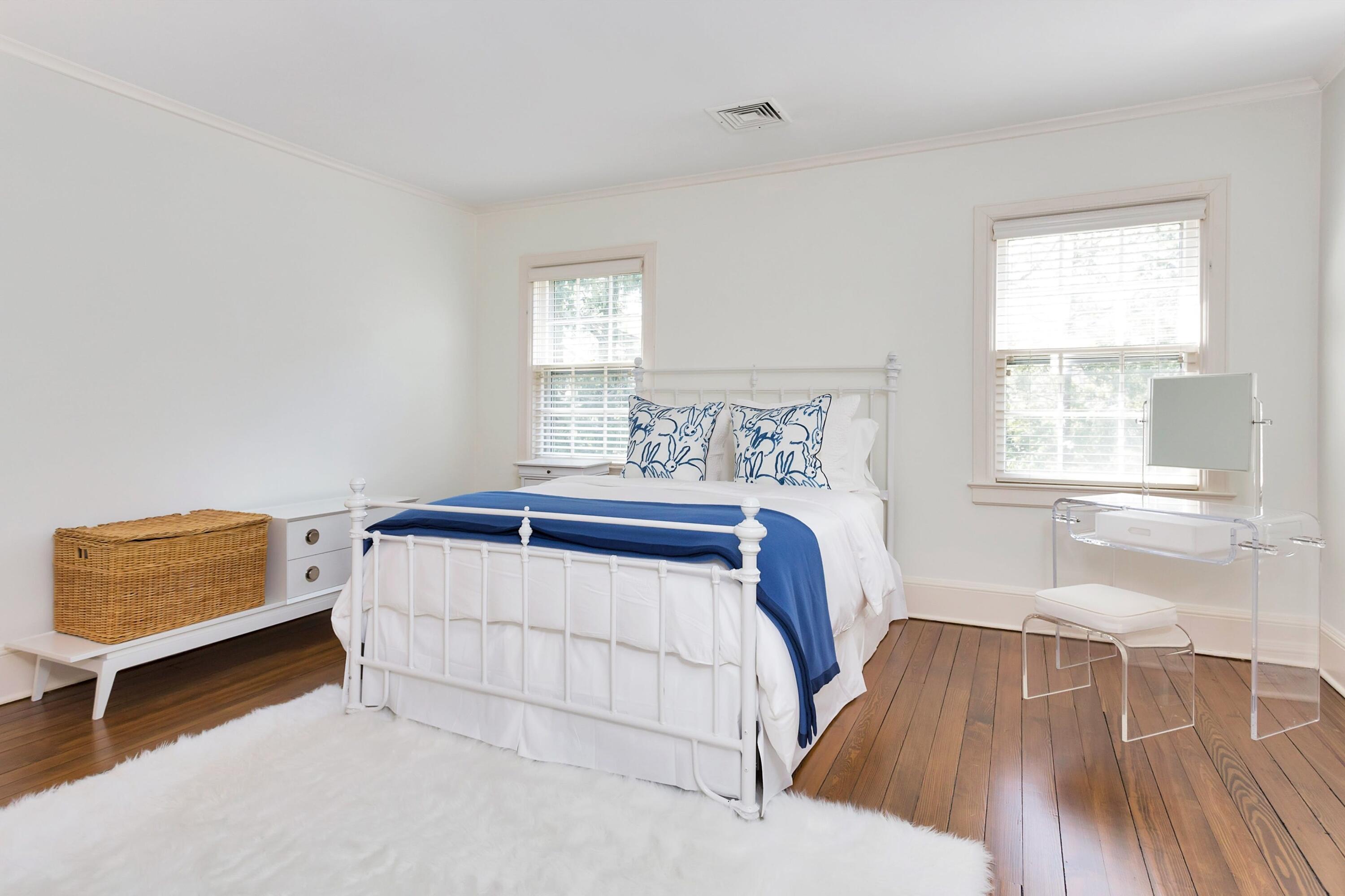 343-335 Wahackme Road New Canaan, CT 06840 - Photo 19 of 32 a bedroom with a bed and a window